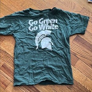 Pro Edge MSU T. Gently used. Tag says YL/7. I’d say it’s a unisex 7/8.